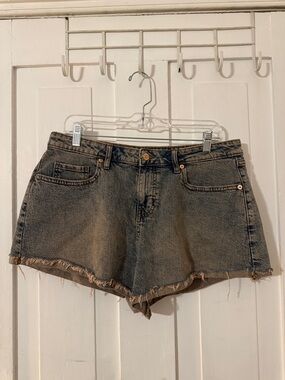 High-Rise Blue Denim Cutoff Shorts with Frayed Hem
